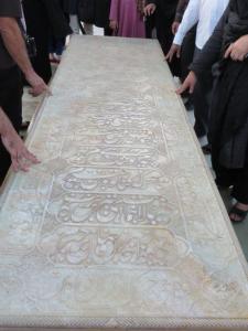 Alabaster sarcophagus of Hafez being stroked in reverence