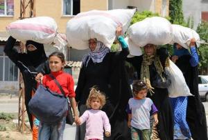 Arab families returning to Tel Abyad