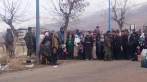 Madaya fake residents guarded by assad soldiers